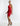 SIDE VIEW FIERY RED SLEEVELESS RUCHED HALTER MINI DRESS WITH CRYSTAL BACK STRAP DETAIL