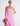 FRONT ZOOM DETAIL VIEW FUCHSIA PINK STRAPLESS DRESS WITH HIGH-LOW RUFFLED HEM