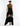 BACK VIEW BLACK BEAUTY SLEEVELESS MOCK NECK LACE INSERT GOWN WITH ASYMMETRICAL HEM