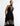 FRONT DETAIL VIEW BLACK BEAUTY SLEEVELESS MOCK NECK LACE INSERT GOWN WITH ASYMMETRICAL HEM