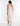 BACK VIEW NATURAL COMBO WOMEN'S ONE SHOULDER LACE RUFFLE GOWN