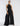 FRONT VIEW WOMEN'S BLACK WIDE-LEG HALTER NECK JUMPSUIT