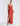 FRONT VIEW RED OCHRE PLUNGING V-NECK PEPLUM GOWN
