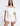 FRONT DETAIL VIEW OFF WHITE OFF-THE-SHOULDER MINI DRESS WITH TULLE DETAILING