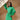 Woman in a green turtleneck balloon sleeve belted midi dress